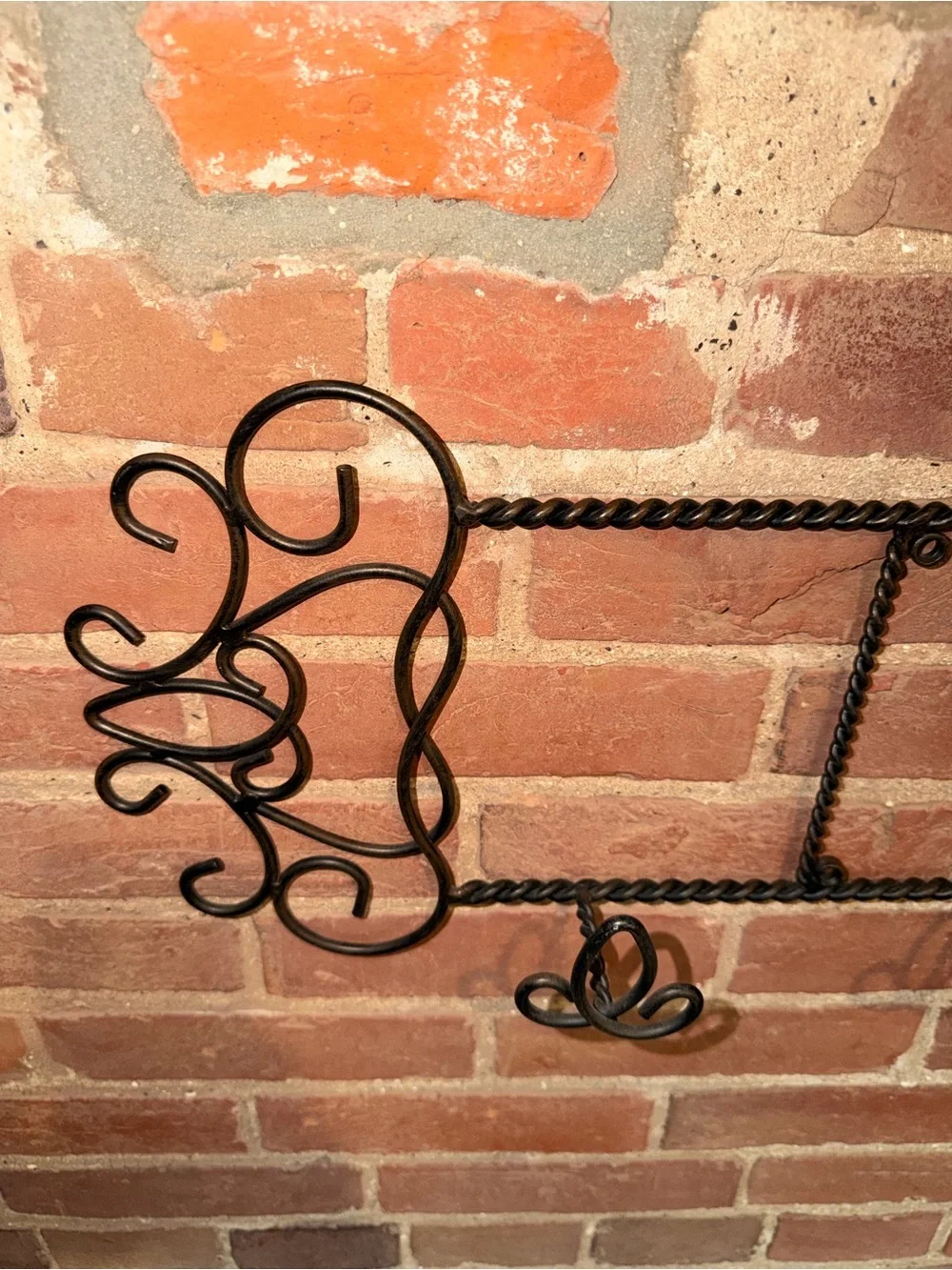 Ornate Black Metal Wall Hook Rack with Scroll Accents
